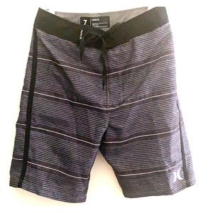 Brand new Hurley Boys Swim Trunks (Size 7).
